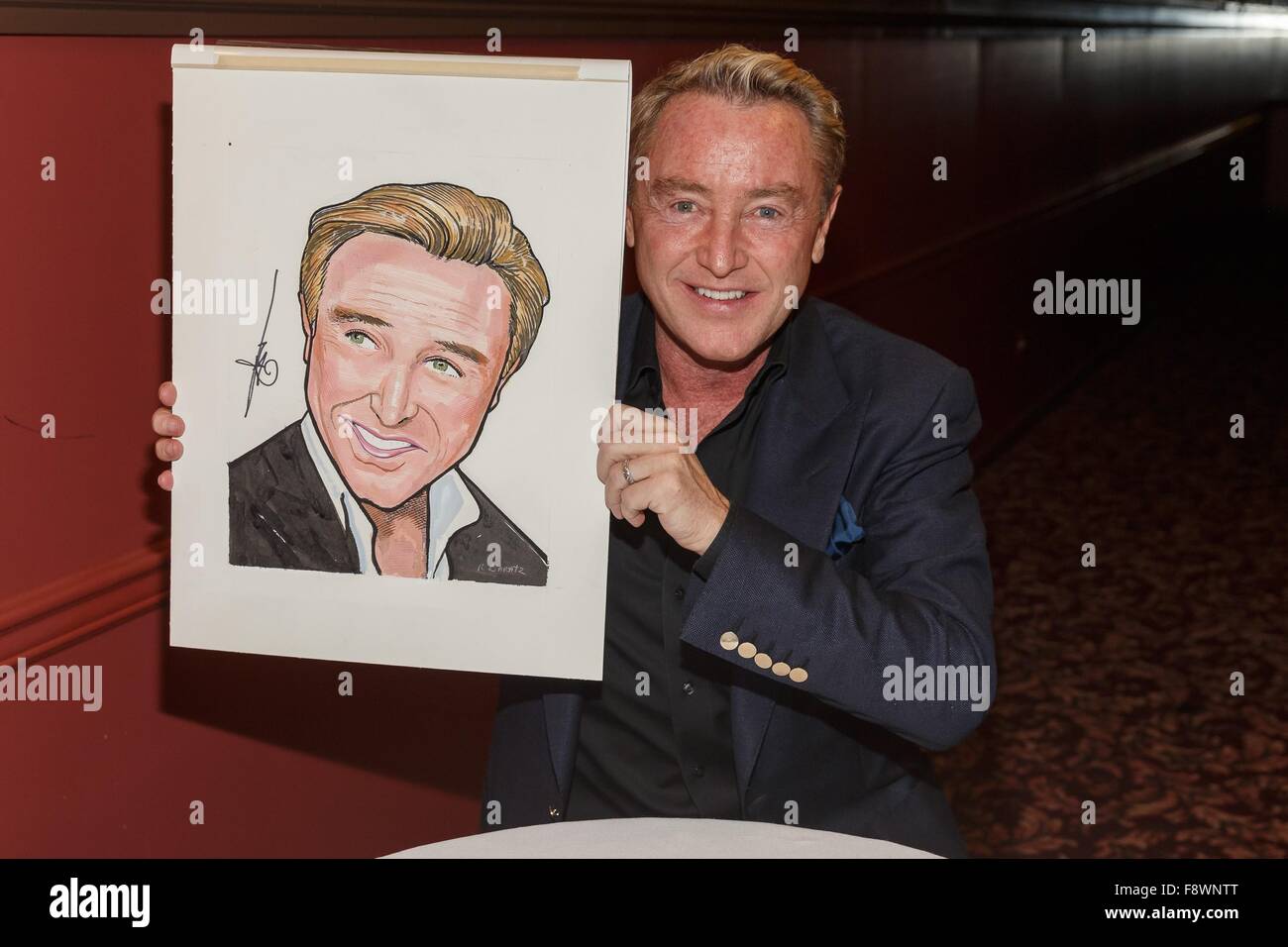 New York, NY, STATI UNITI D'AMERICA. Undicesimo Dec, 2015. Michael Flatley ad una apparizione pubblica per il Signore della danza Michael Flatley diventa caricatura ritratto a Sardi, sardi del ristorante dell'albergo, New York, NY Dicembre 11, 2015. Credito: Jason Smith/Everett raccolta/Alamy Live News Foto Stock