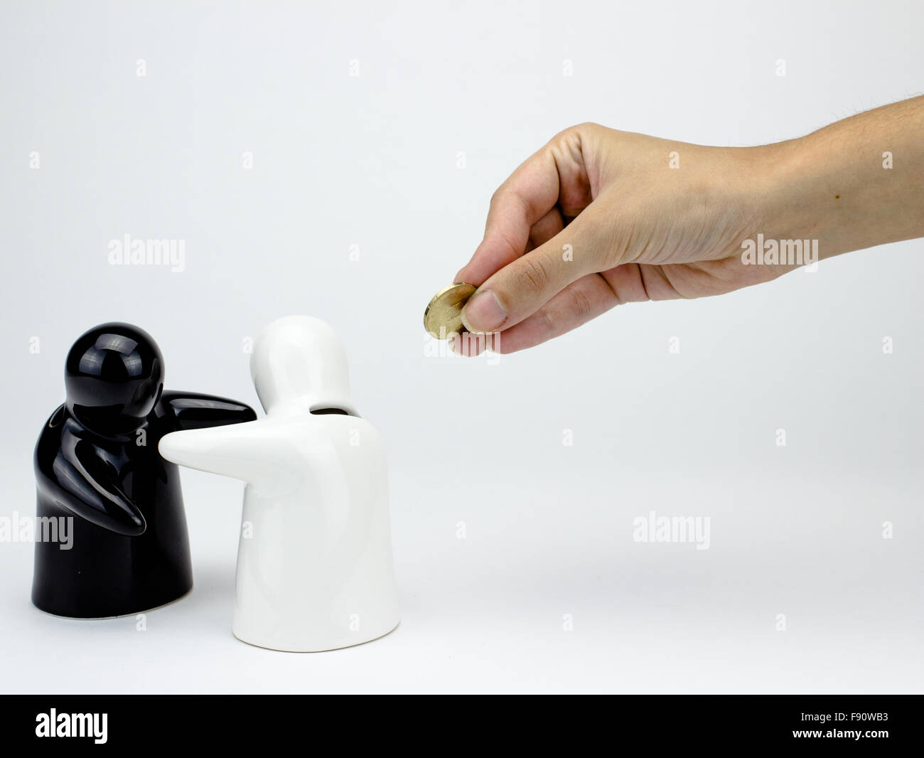 Penny ceramica bak figurine su sfondo bianco Foto Stock