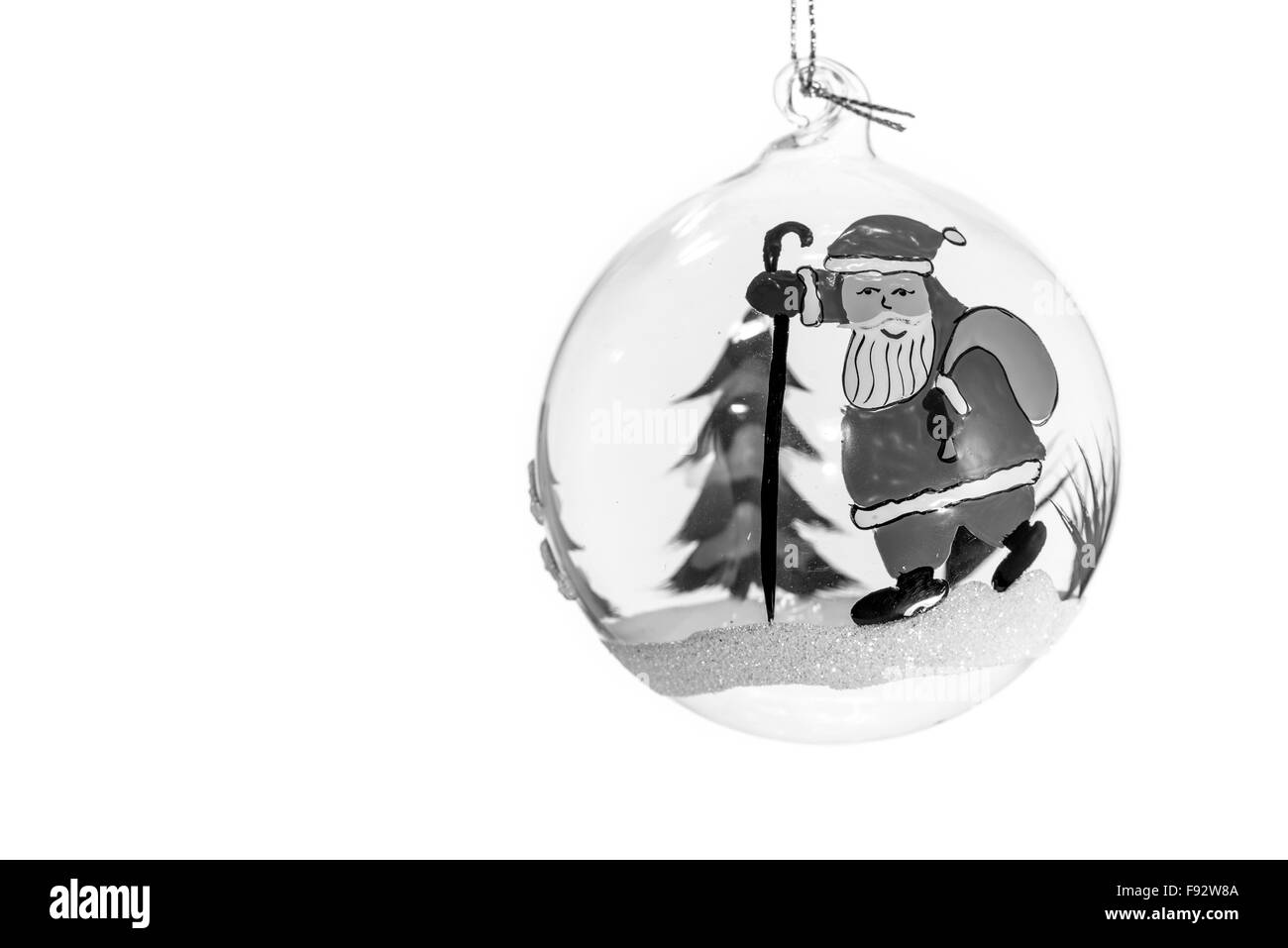 Crystal palla di Natale con Babbo Natale e un albero Foto Stock