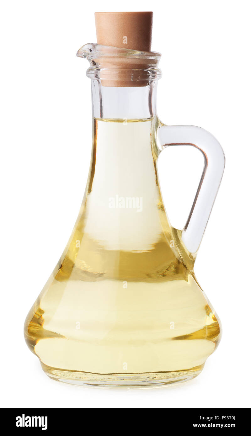 Di oliva o di olio di semi di girasole in una bottiglia di vetro con sughero isolati su sfondo bianco Foto Stock