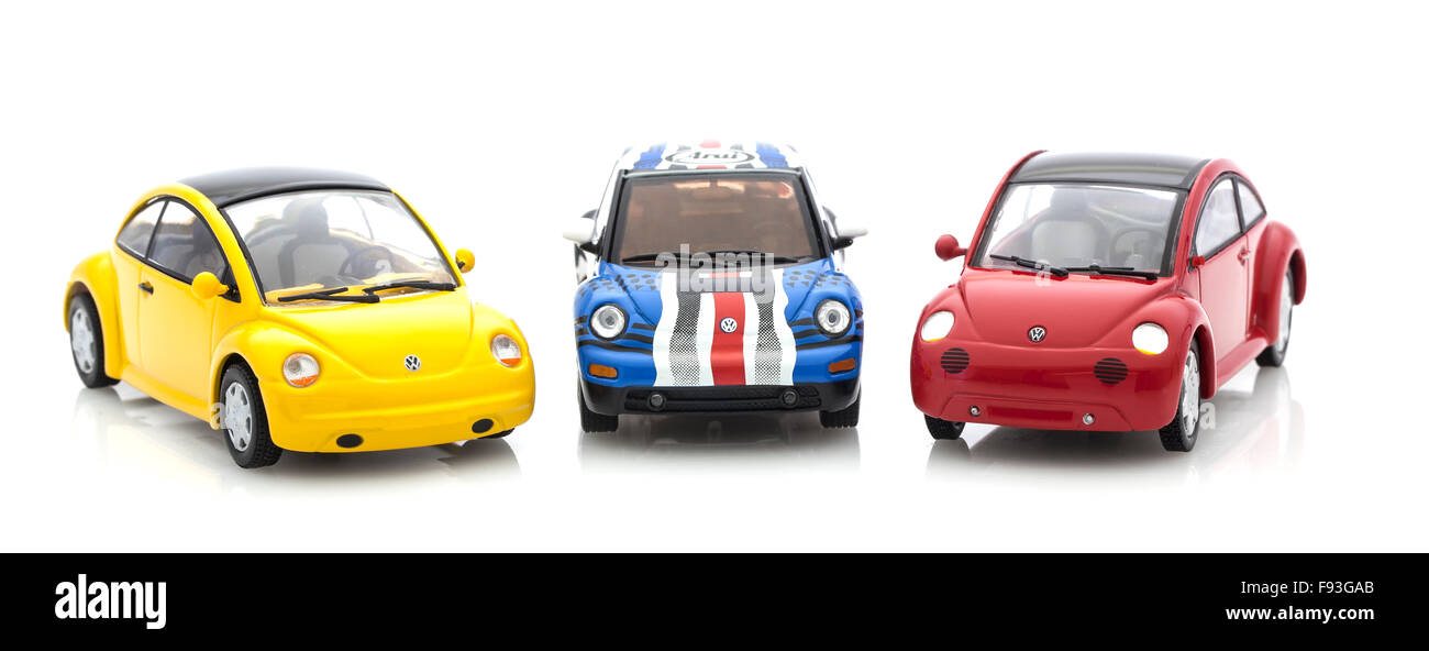 3 VW Beetle die cast modelli su uno sfondo bianco. Foto Stock