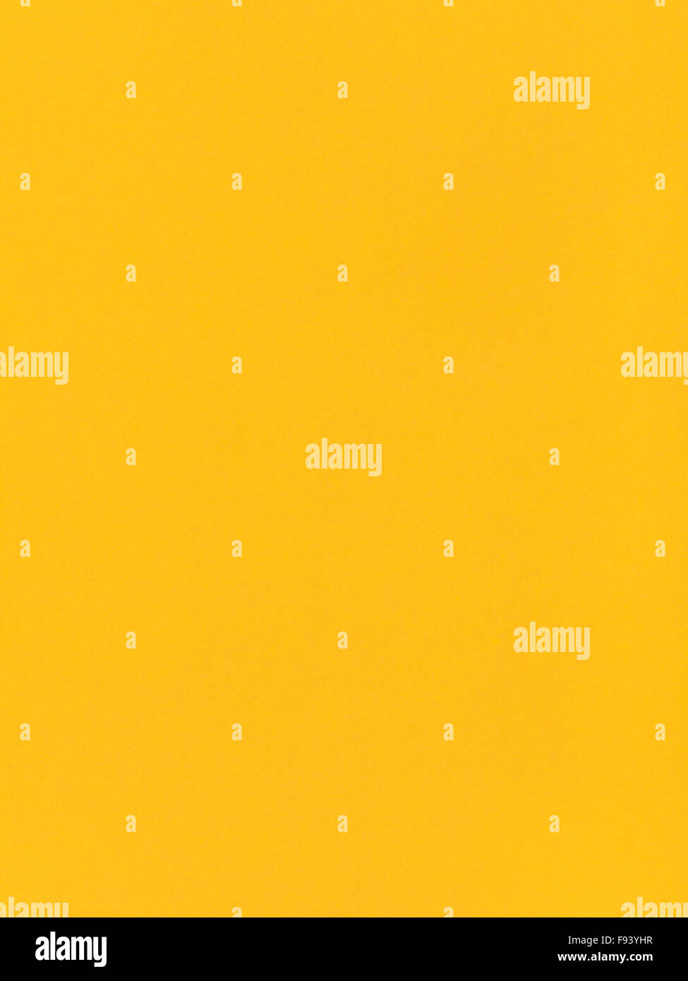 Sfondo verticale dal colore giallo scuro nei toni del foglio di carta Foto  stock - Alamy