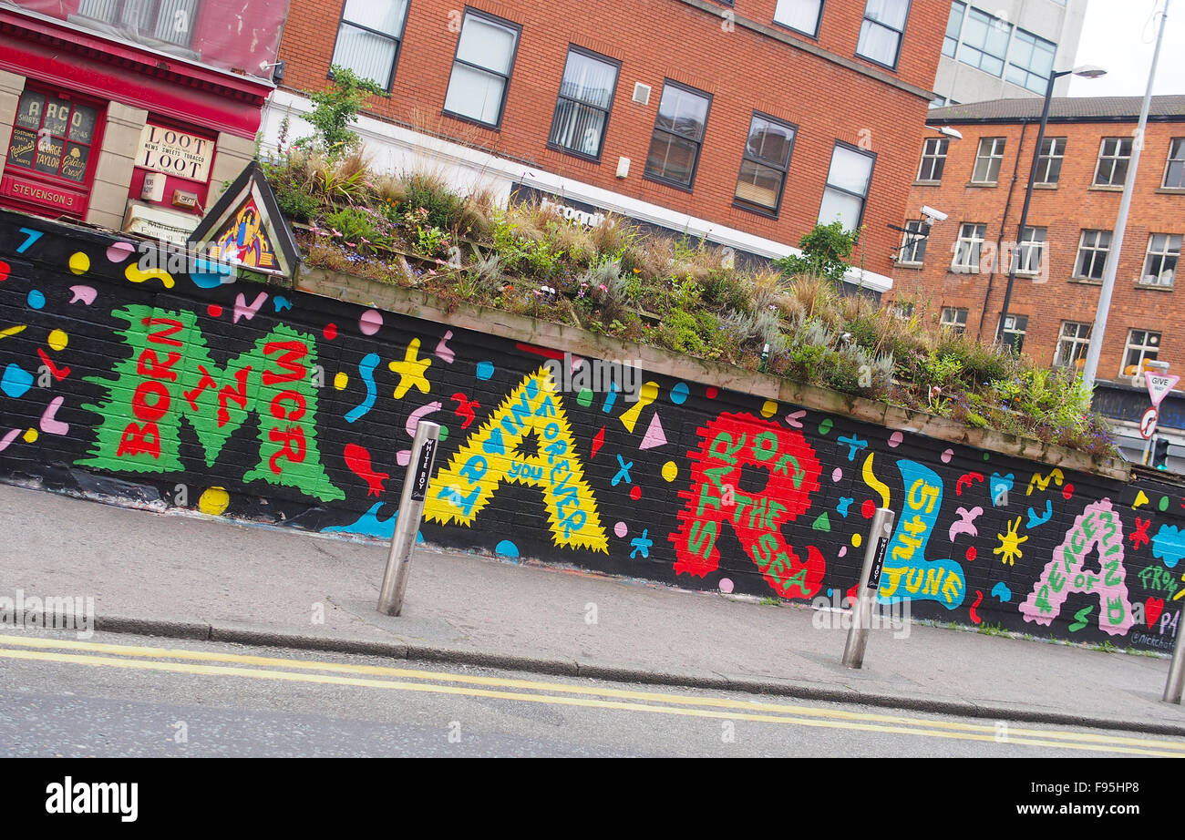 Arte di strada in Piazza Stevenson, leva Street, il centro città di Manchester, UK. Foto Stock