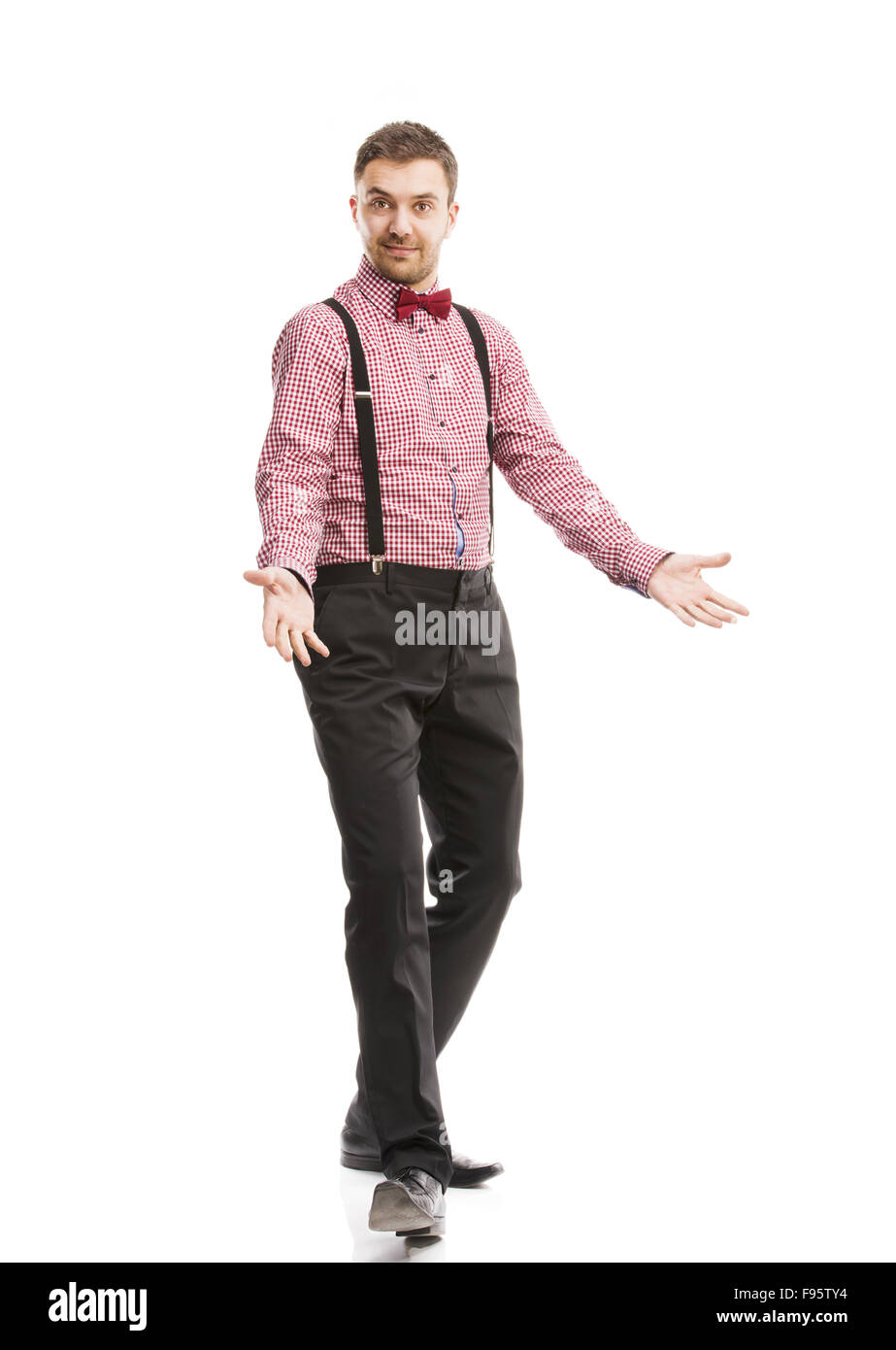 Funny business man è in posa di studio con il filtro bow tie e bretelle  Foto stock - Alamy