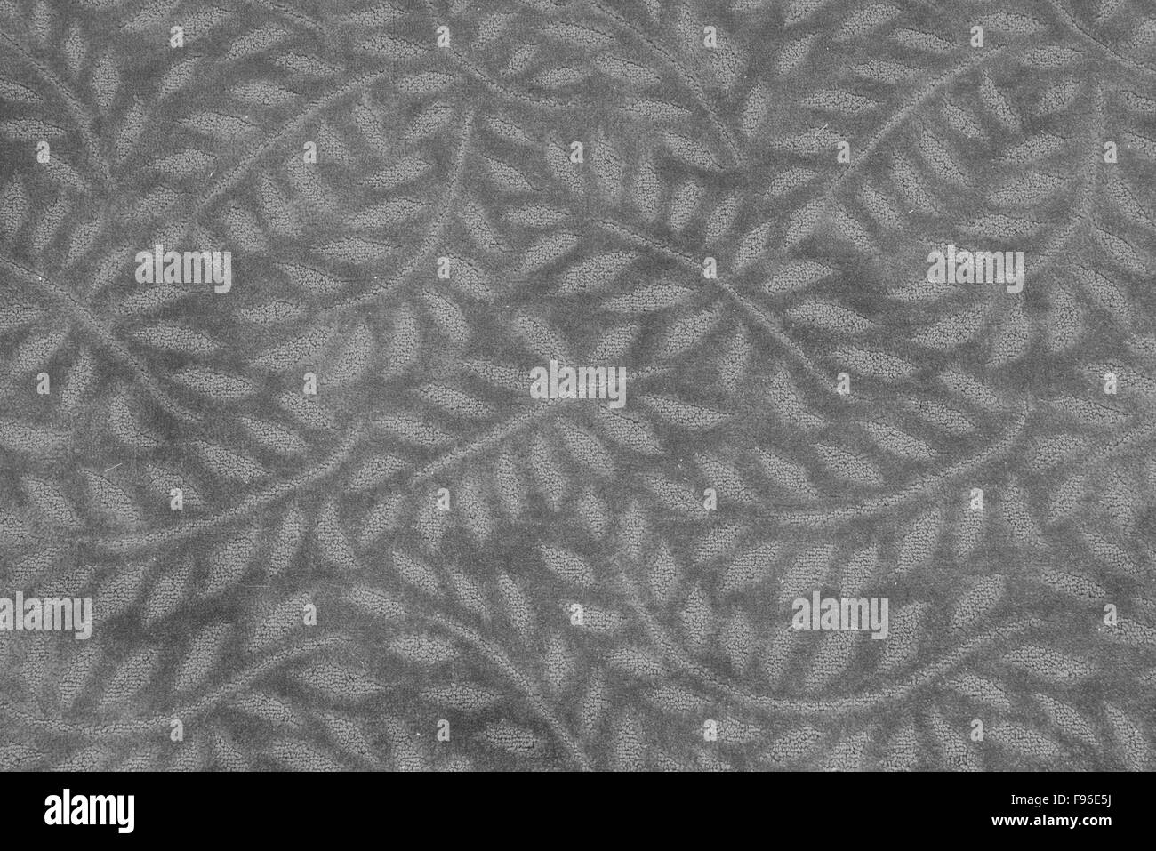 Modello di foglia sul tappeto in bianco e nero Foto Stock