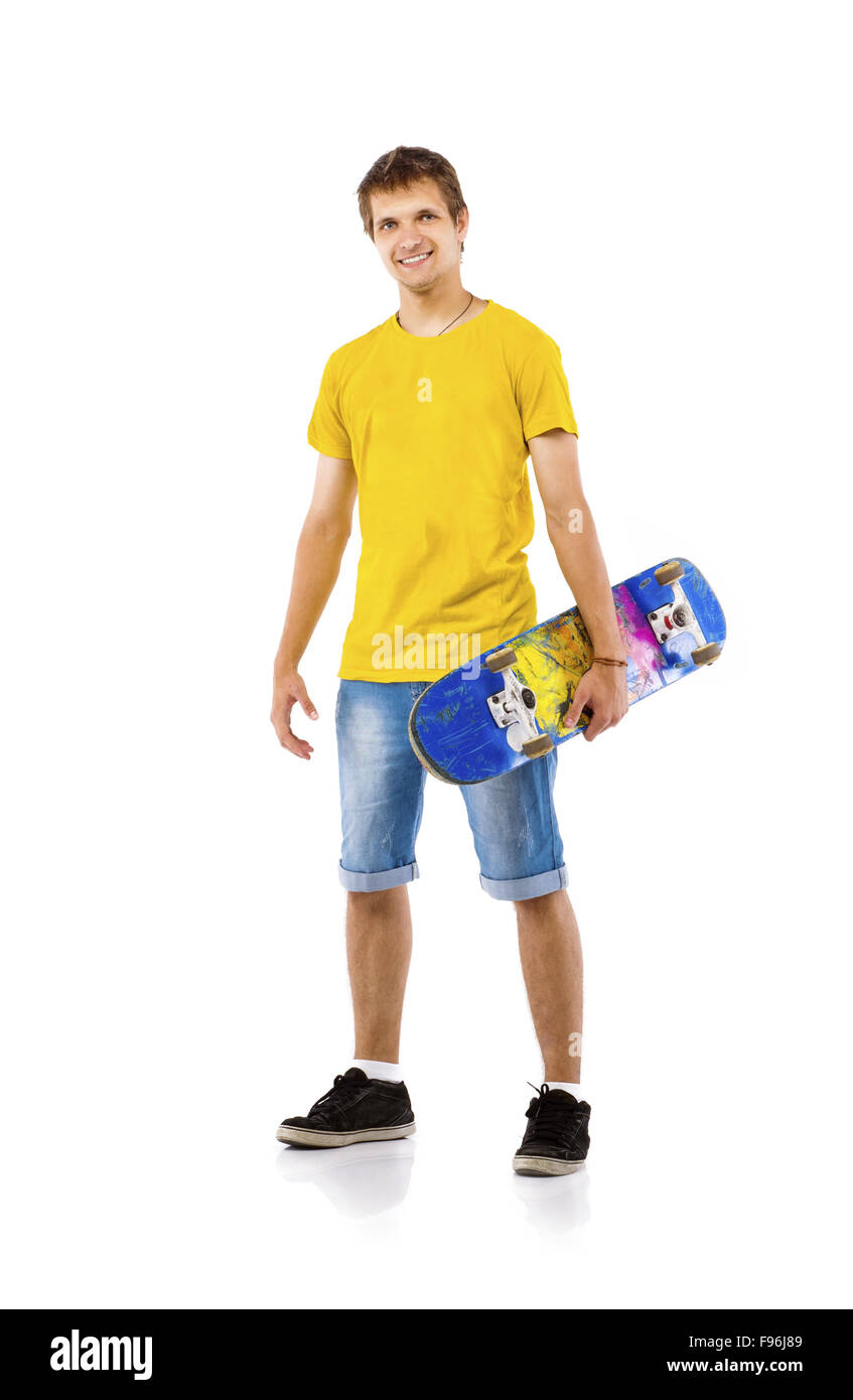 Ritratto in studio di un giovane uomo con lo skateboard isolate su sfondo bianco Foto Stock