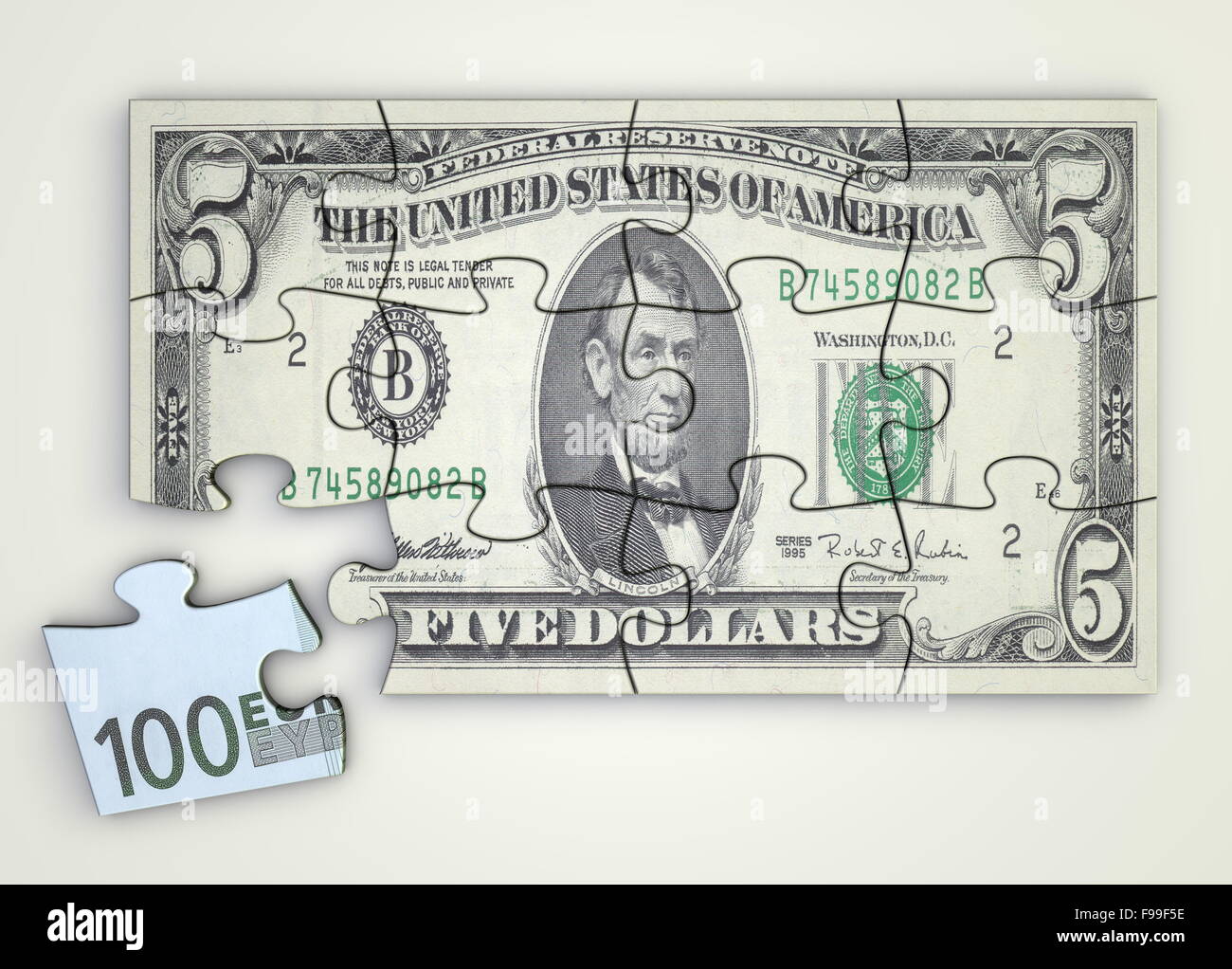 5 Dollar Nota Puzzle e Euro pezzo Foto Stock 5 Dollar Nota Puzzle e Euro pezzo Foto Stock