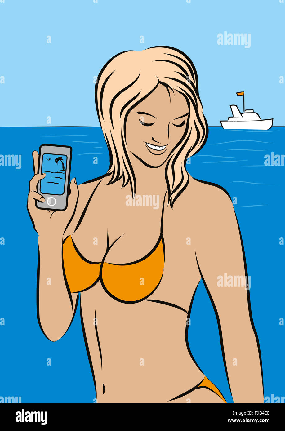 Bella ragazza nuda con lo smartphone sulla spiaggia. Foto Stock