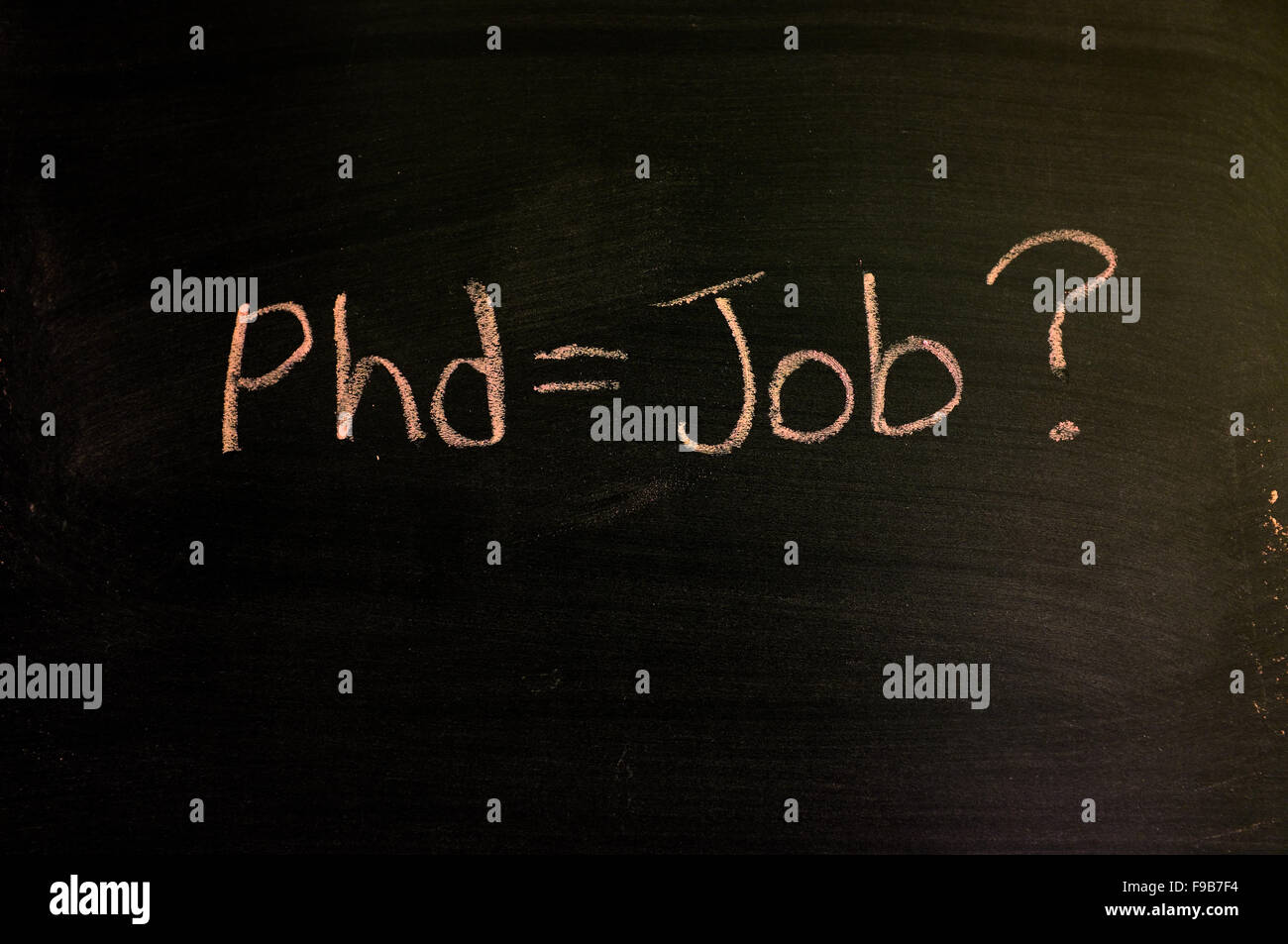 Phd+lavoro? Scritti su una lavagna in gesso. Foto Stock