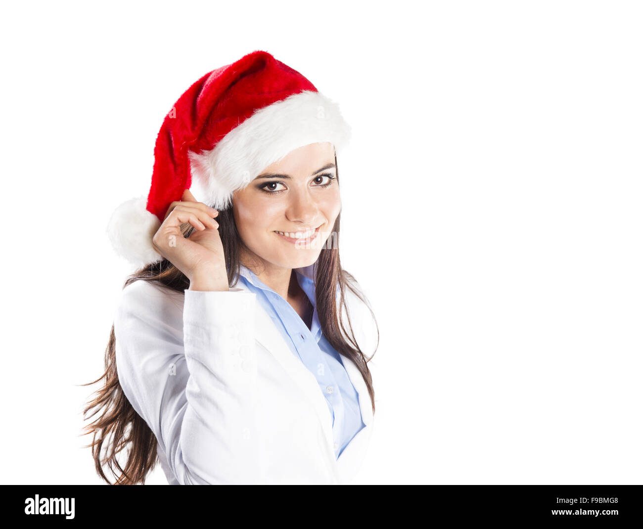 Ritratto di donna attraente isolato su bianco backgroud con cappello di Natale Foto Stock