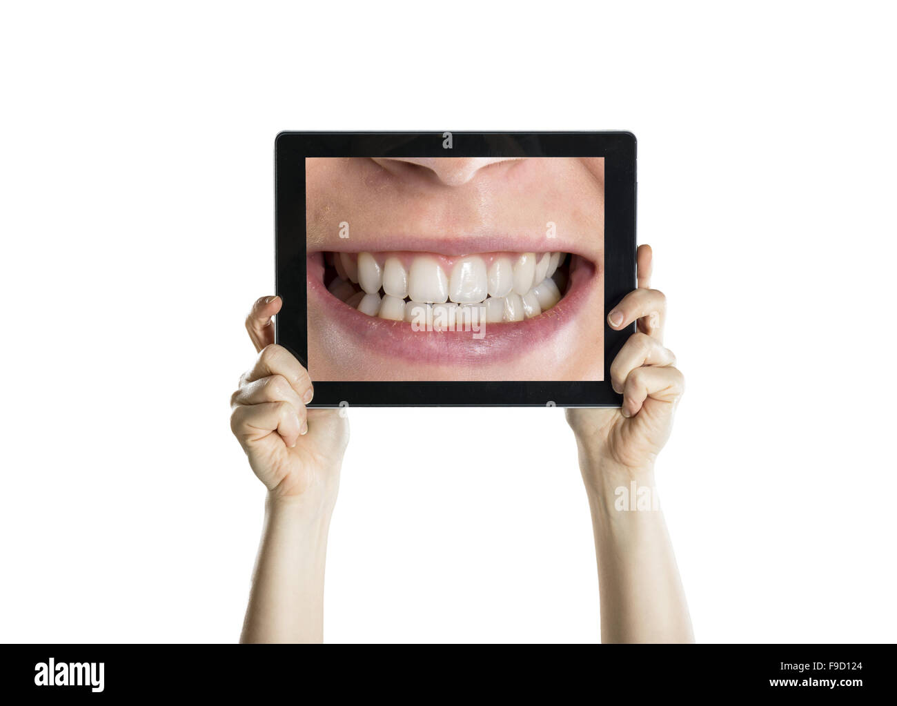 Dental closeup con schermo tablet, isolato su bianco Foto Stock