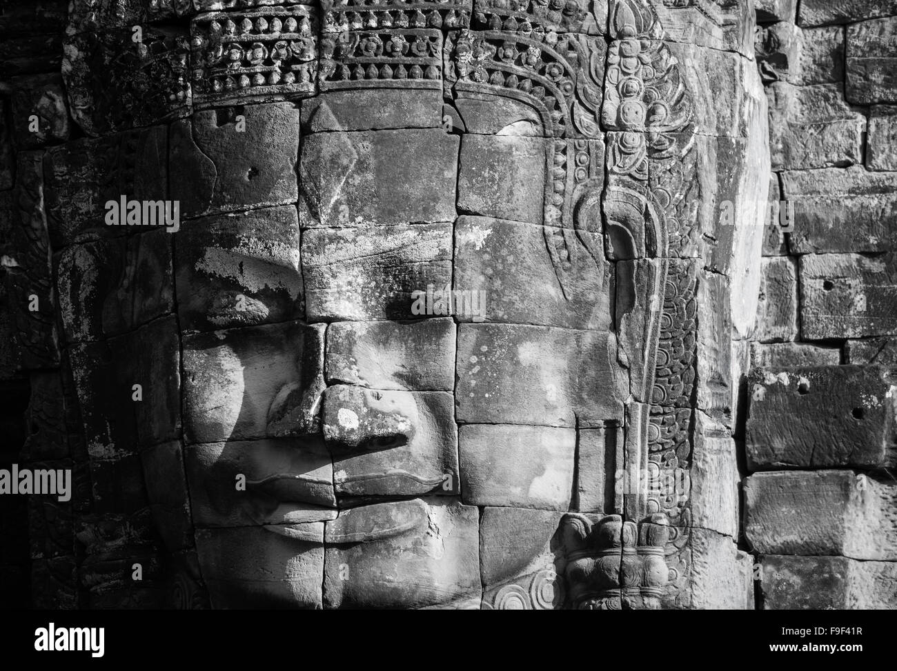 Faccia di pietra al tempio Bayon, Angkor, Cambogia Foto Stock