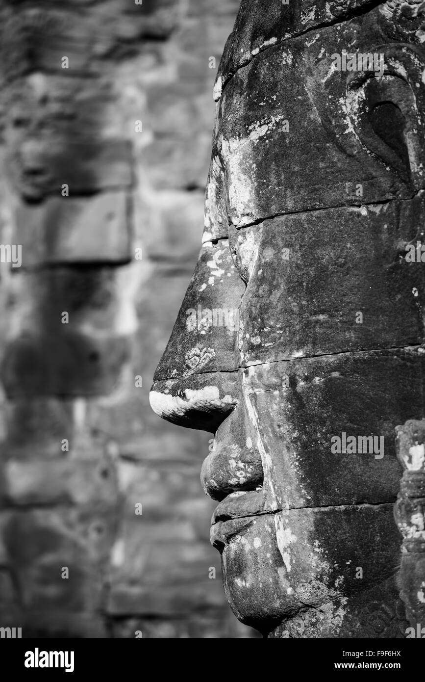 Faccia di pietra al tempio Bayon, Angkor, Cambogia Foto Stock
