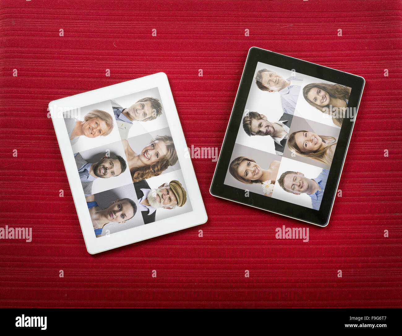 Due compresse con facce di diverse persone. Studio shot sul vino colore di sfondo. Foto Stock