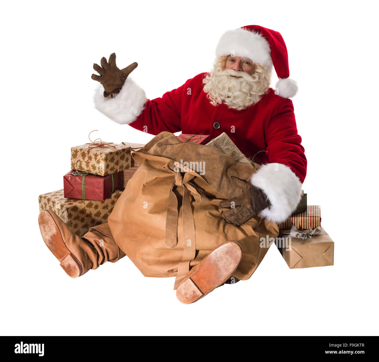 Babbo Natale seduto con il suo grande sacco pieno di doni e giocattoli  ritratto completi Foto stock - Alamy