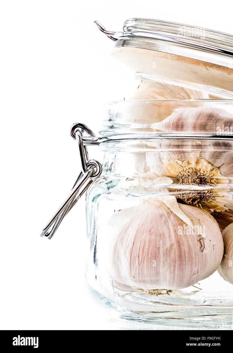 Aglio bianco in un vasetto di storage Foto Stock