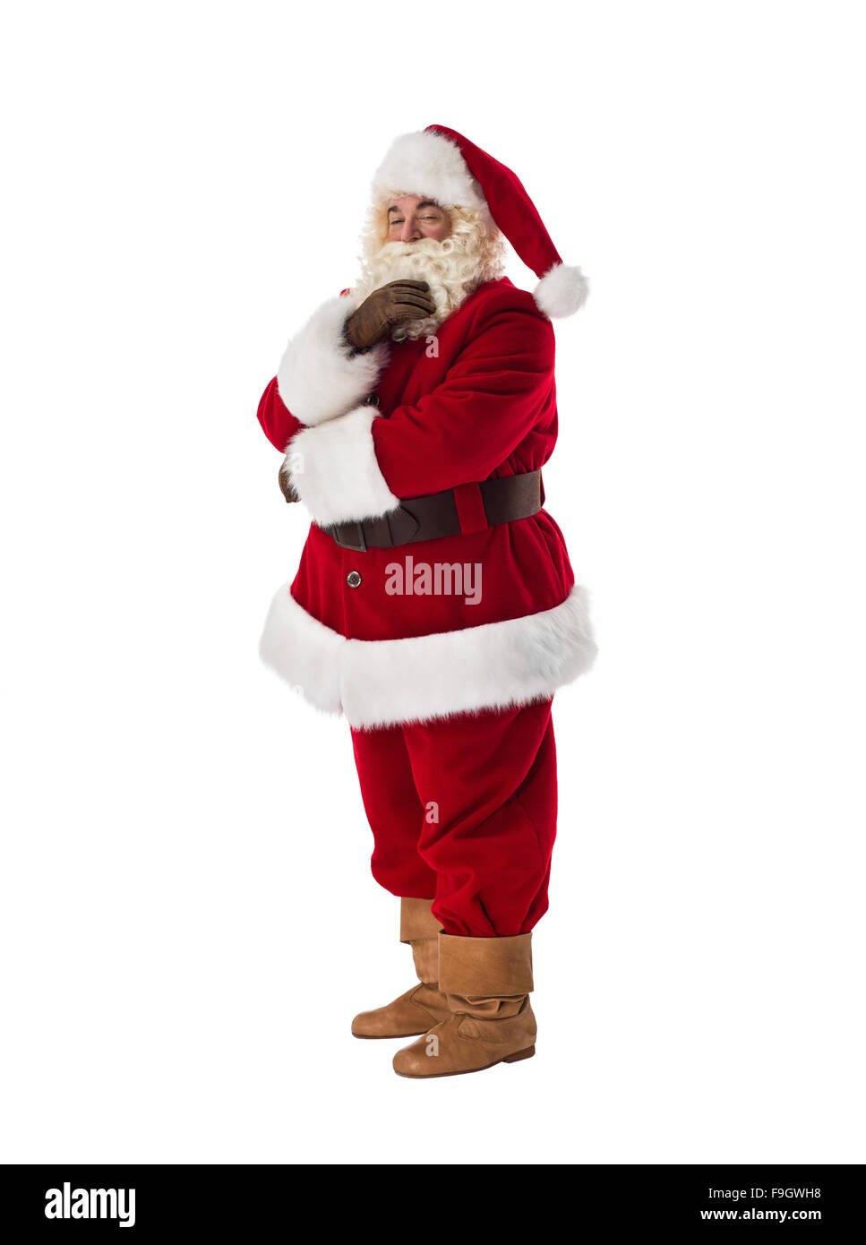 Babbo Natale pensando a piena lunghezza verticale. Isolato su sfondo bianco Foto Stock