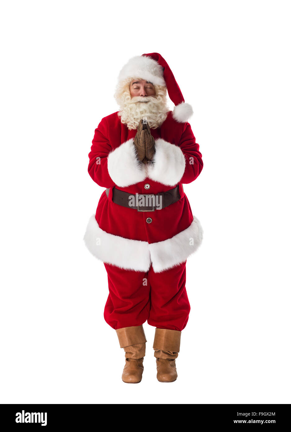 Santa Claus meditando o volendo a piena lunghezza verticale. Isolato su sfondo bianco Foto Stock