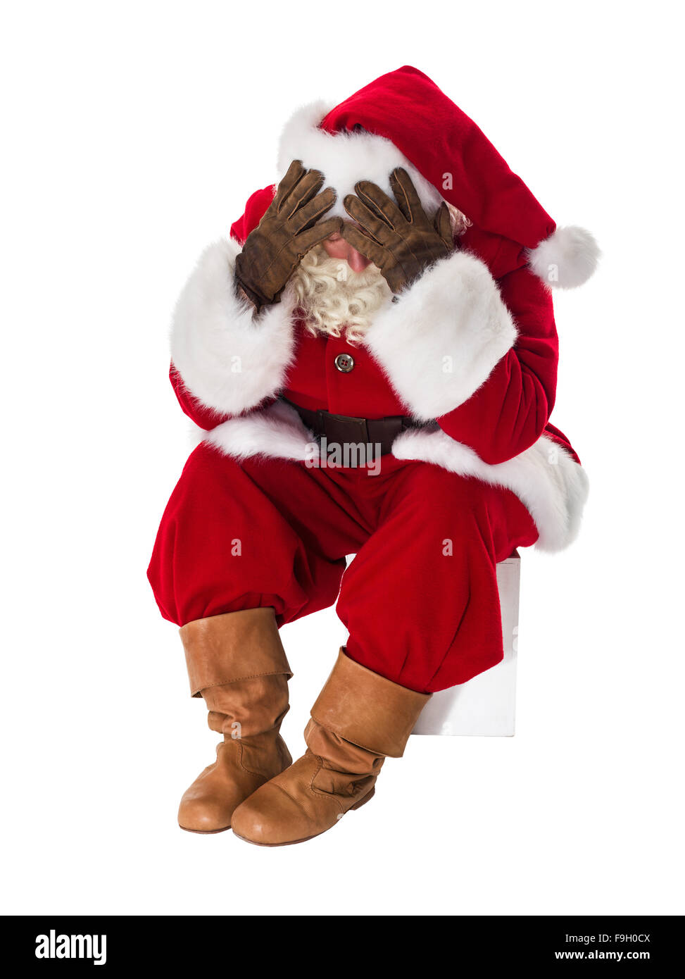 Santa Claus in guai a piena lunghezza verticale. Isolato su sfondo bianco Foto Stock