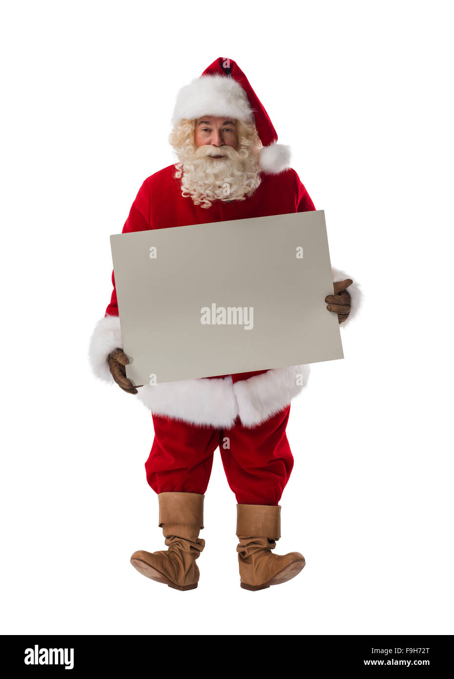 Santa Claus holding bianco segno bianco a piena lunghezza verticale. Isolato su sfondo bianco Foto Stock