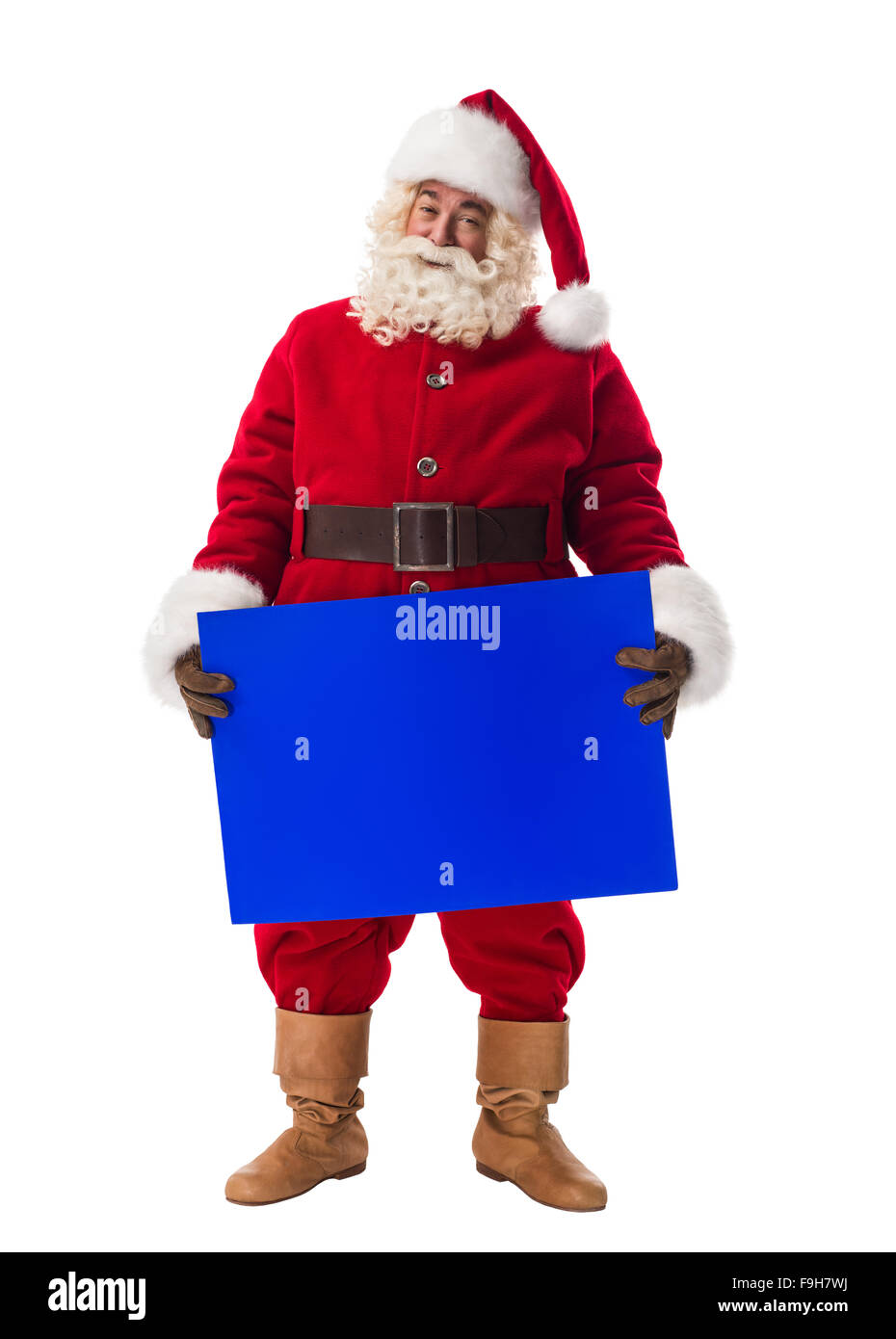 Santa Claus azienda blu segno bianco a piena lunghezza verticale. Isolato su sfondo bianco Foto Stock