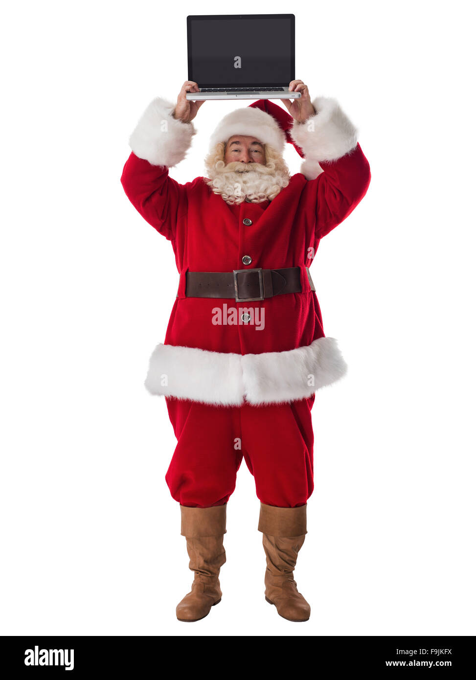 Babbo Natale con il computer portatile a piena lunghezza Ritratto isolato su sfondo bianco Foto Stock