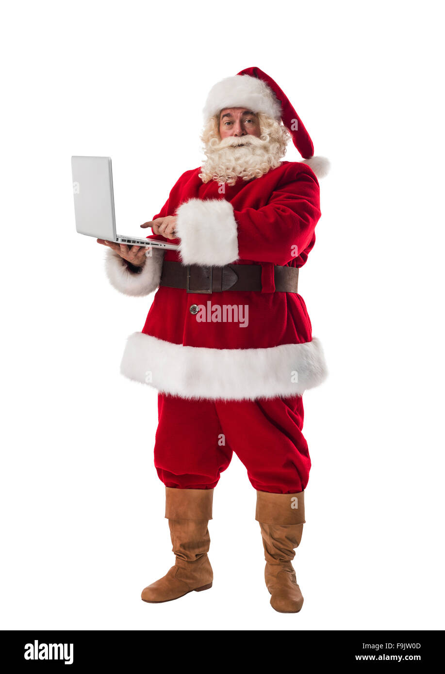 Santa Claus holding laptop a piena lunghezza Ritratto isolato su sfondo bianco Foto Stock