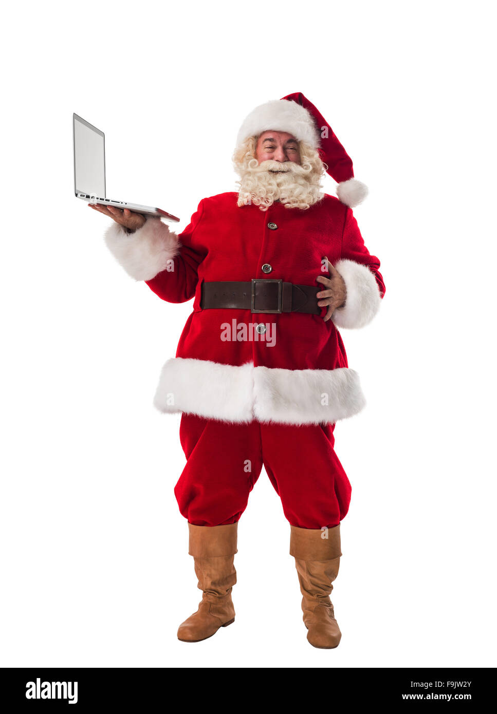 Santa Claus holding laptop a piena lunghezza Ritratto isolato su sfondo bianco Foto Stock