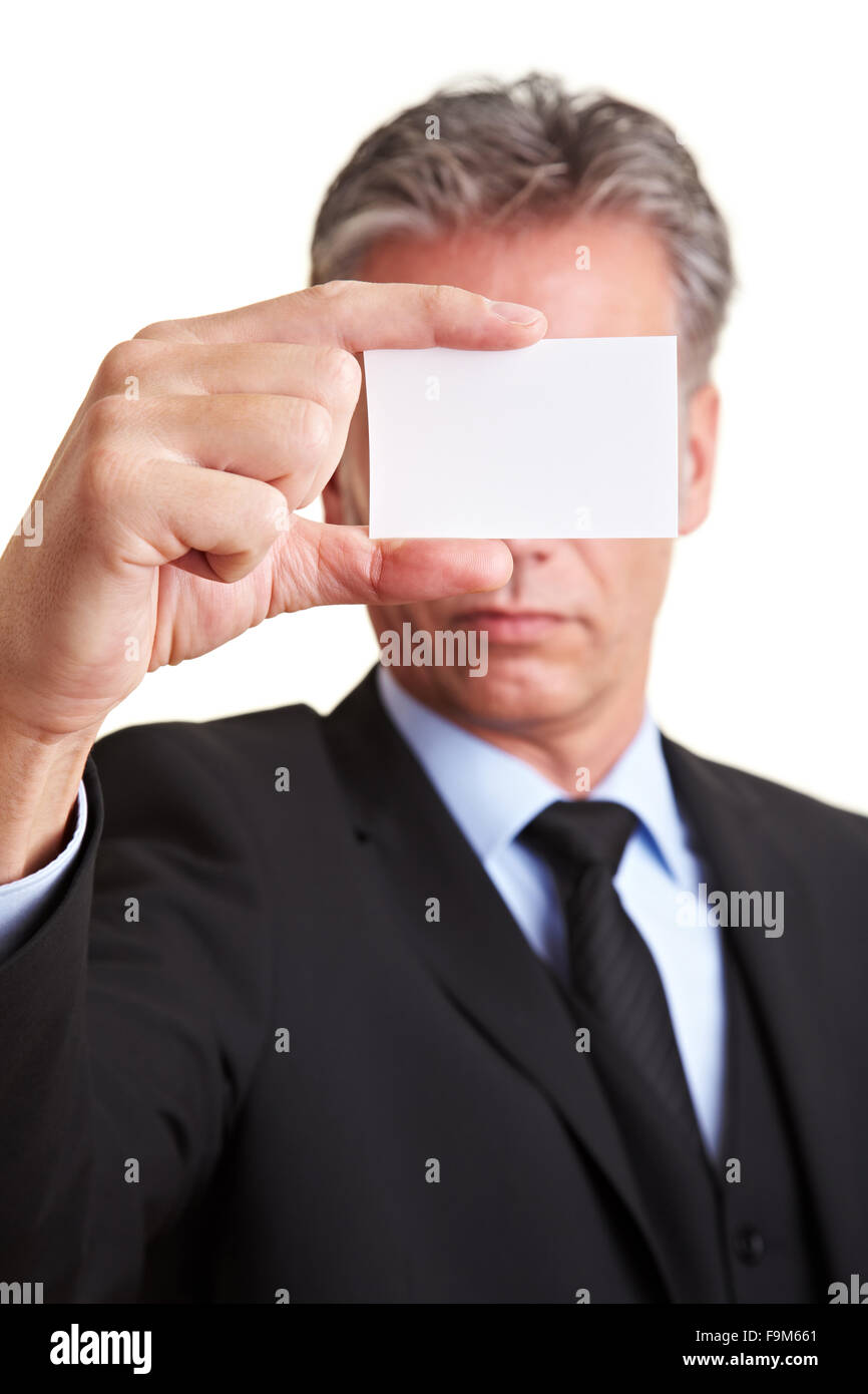 Manager azienda white business card davanti al suo volto Foto Stock
