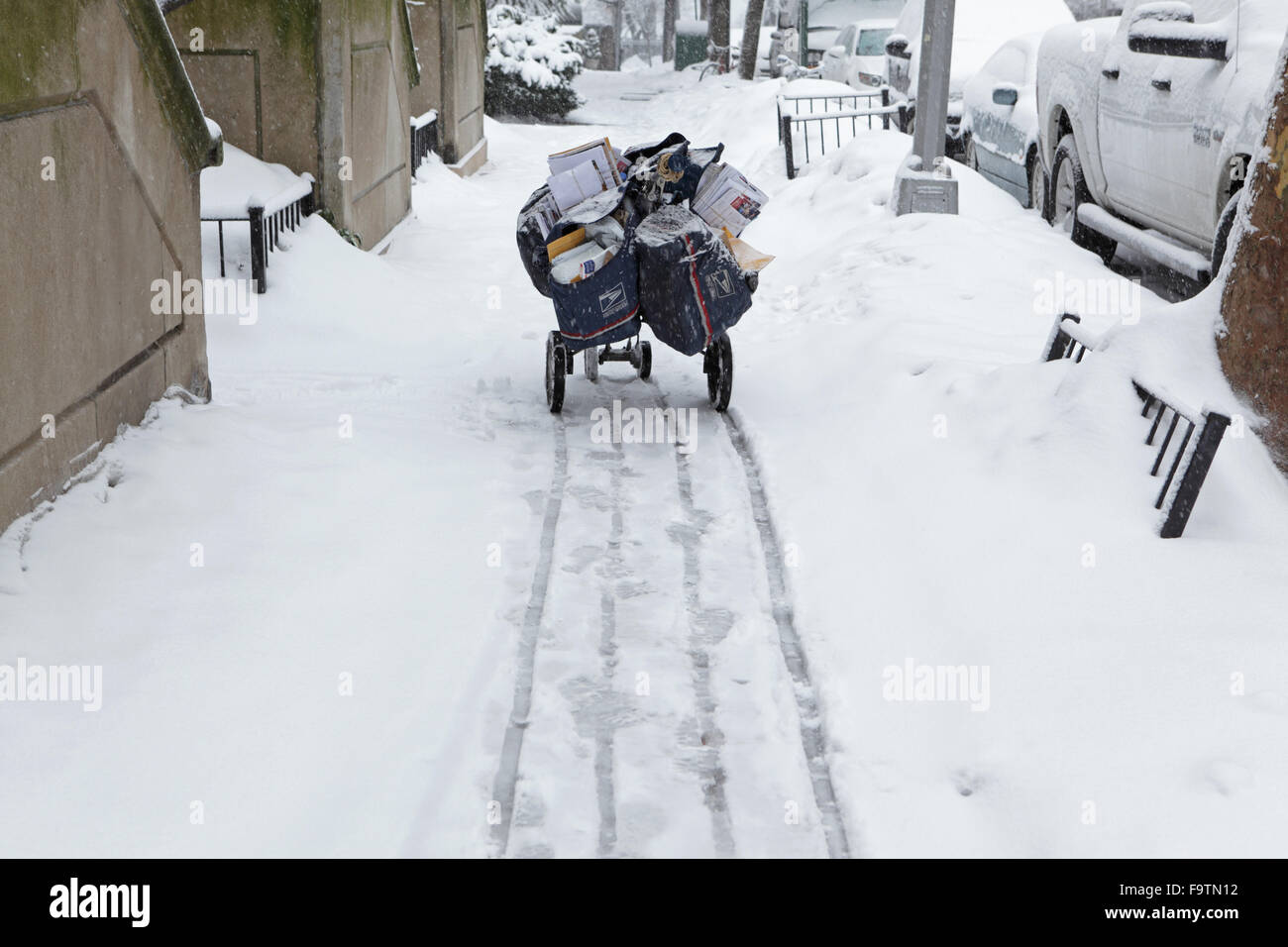 US Postal Service Delivery carrello in una tempesta di neve Foto Stock
