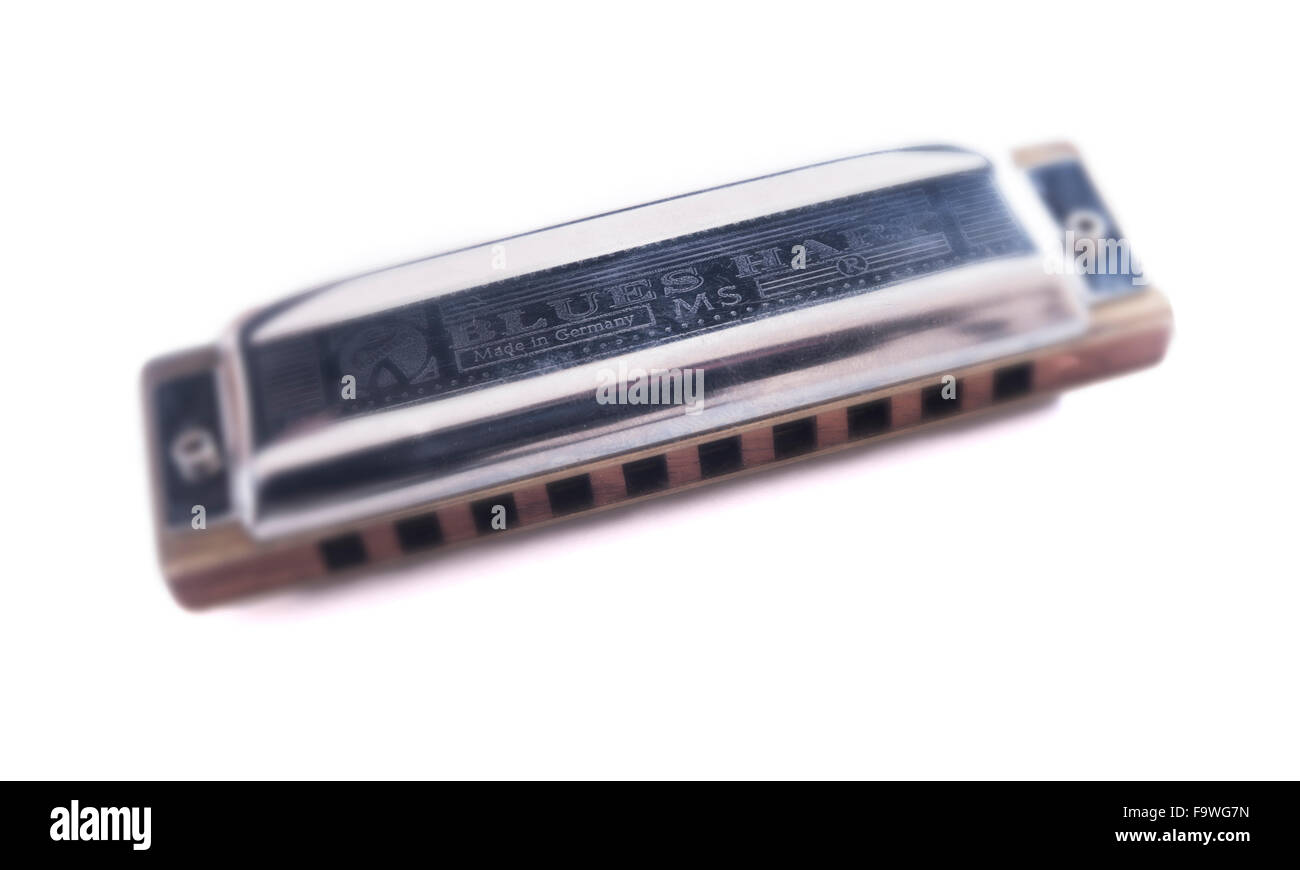 Foto stilizzata di una armonica o armonica a bocca. Il tipo è una Hohner Blues Harp. Foto Stock