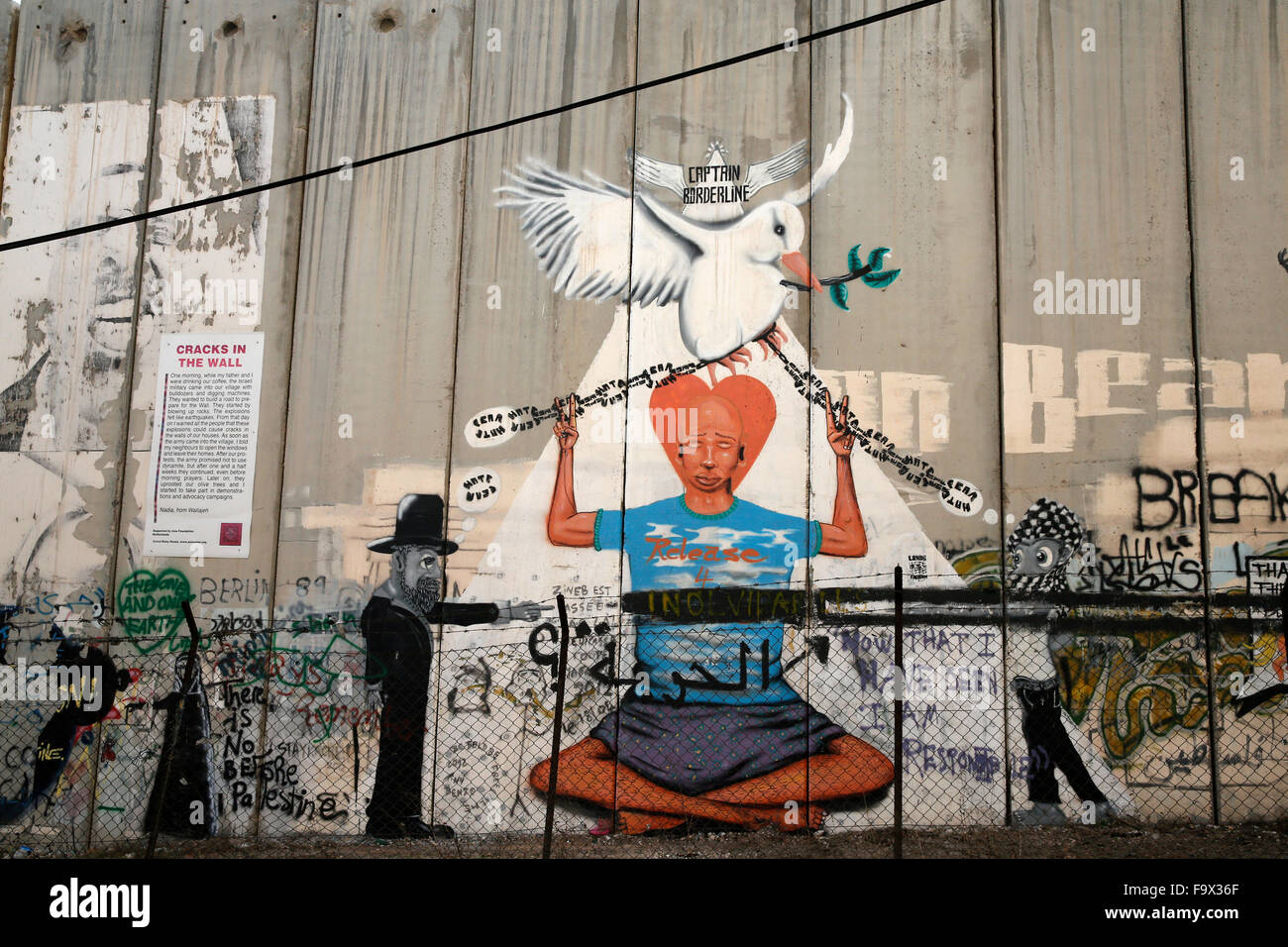 Tag e graffiti su Israele Cisgiordania barriera di sicurezza. Foto Stock