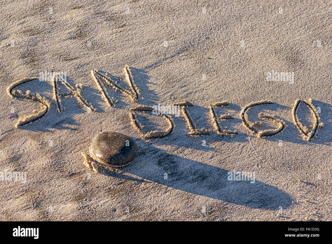 La parola di San Diego scritto nella sabbia. Foto Stock