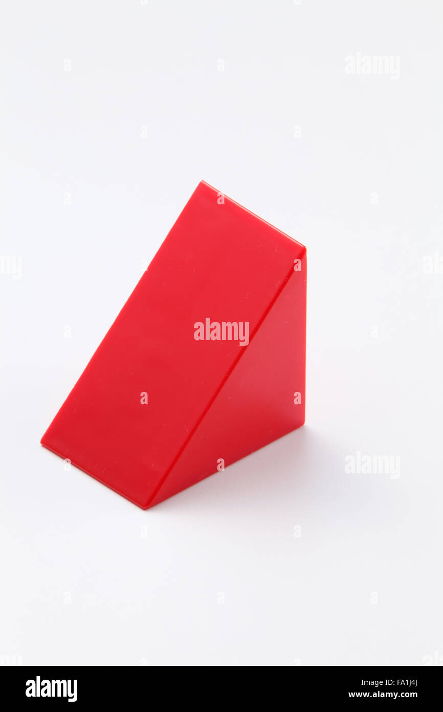 Forma triangolare del blocco per costruzioni Foto Stock