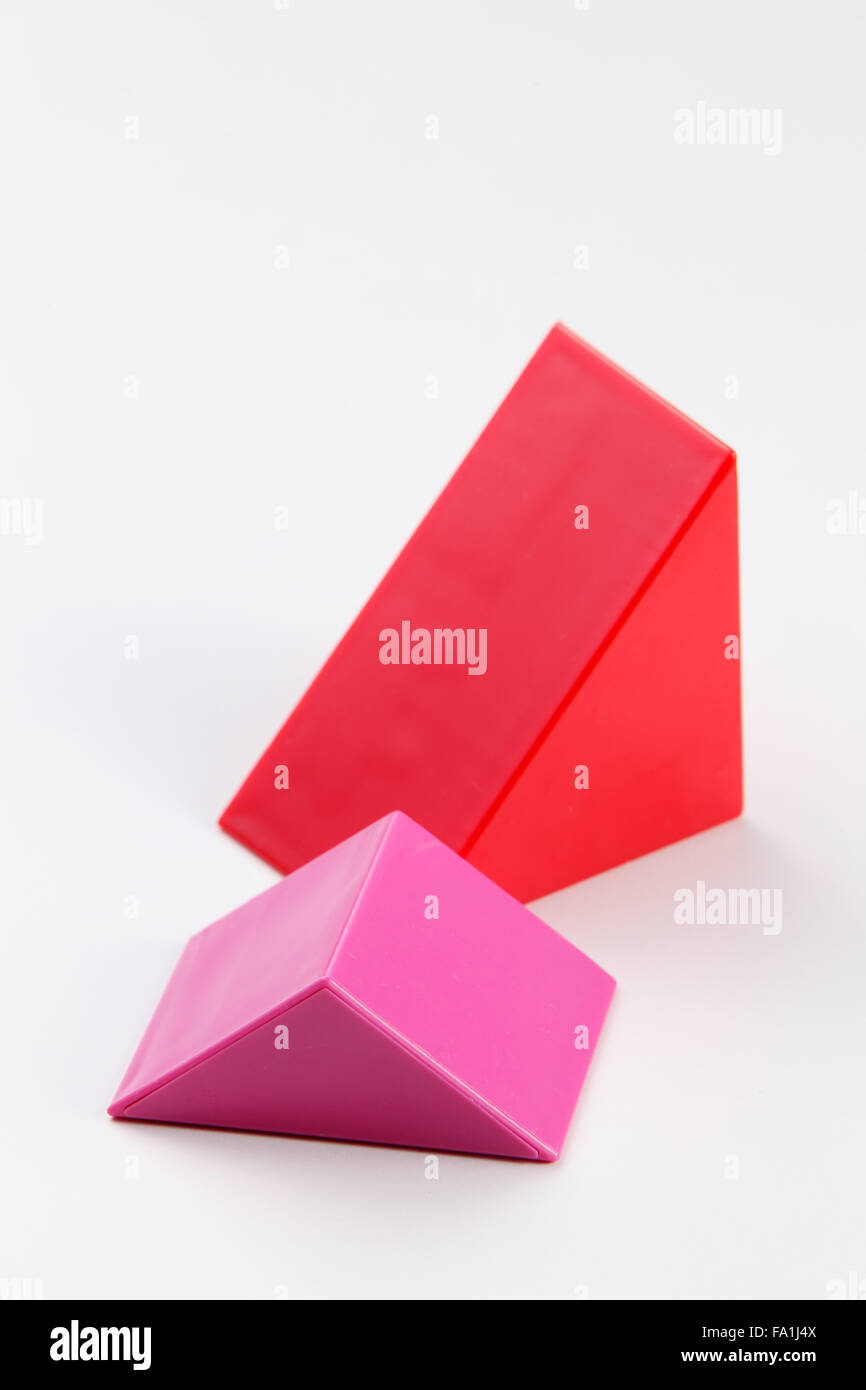 Forma triangolare del blocco per costruzioni Foto Stock