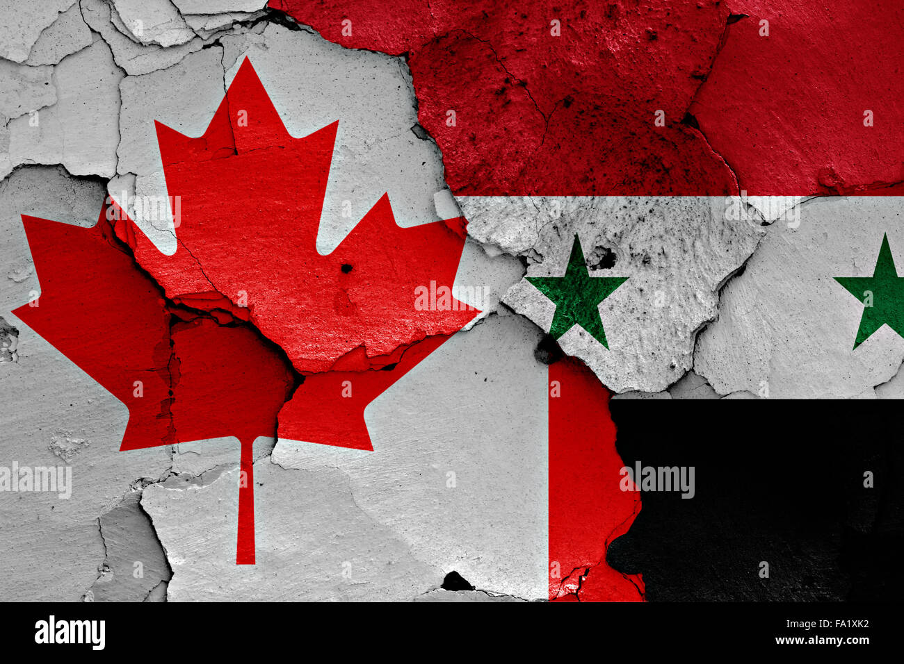 Bandiere di Canada e Siria dipinta sulla parete incrinato Foto Stock