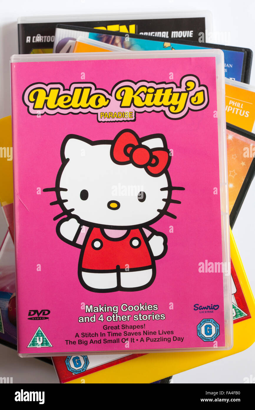 Pila di DVD con Hello Kitty Hello Kitty's Paradise DVD sulla parte superiore Foto Stock