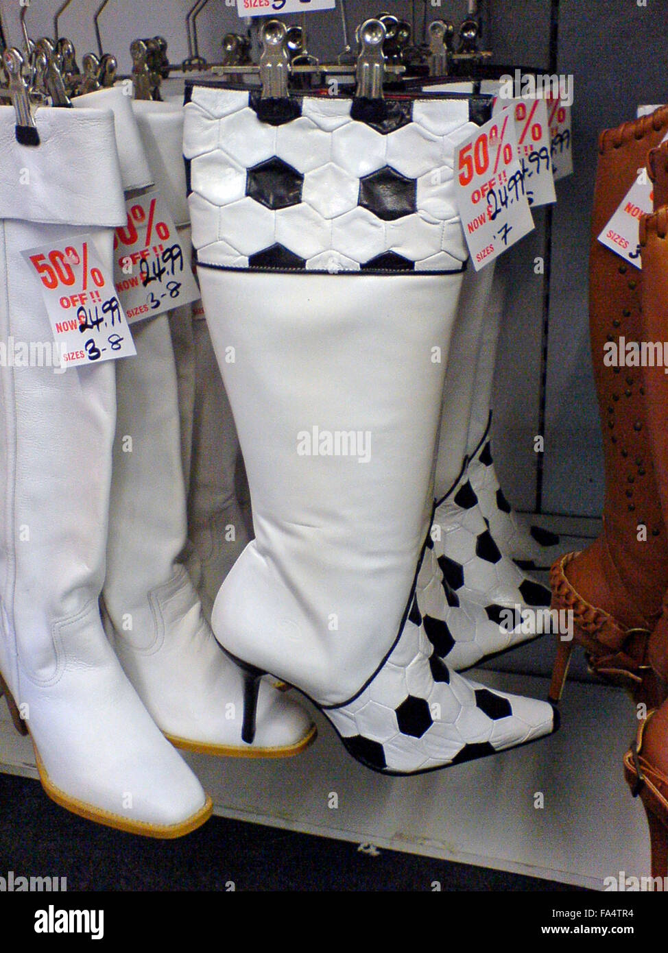 Il calcio tacco alto stivali Foto Stock