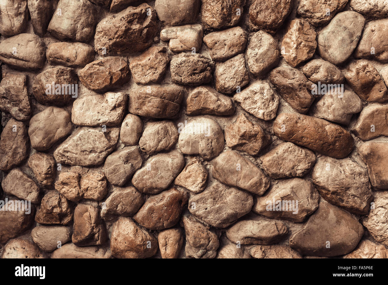 Muro di pietra Texture di forme diverse di pietre simili a parete . Foto Stock