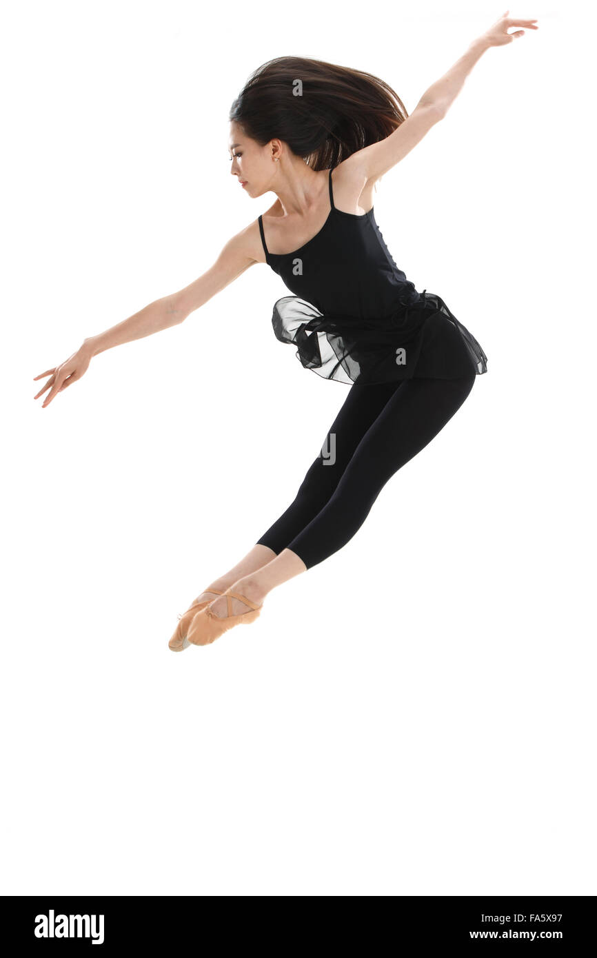 La giovane donna è dancing Foto Stock