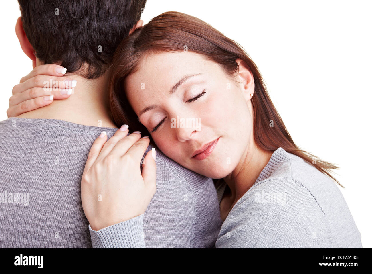 Stanco donna che dorme sulla spalla del suo uomo Foto Stock