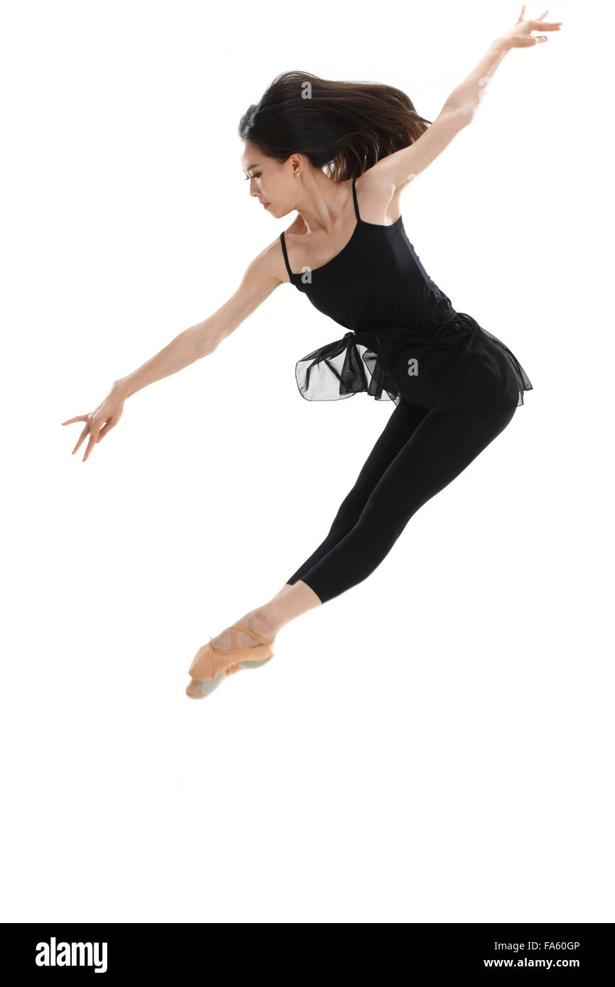 La giovane donna è dancing Foto Stock