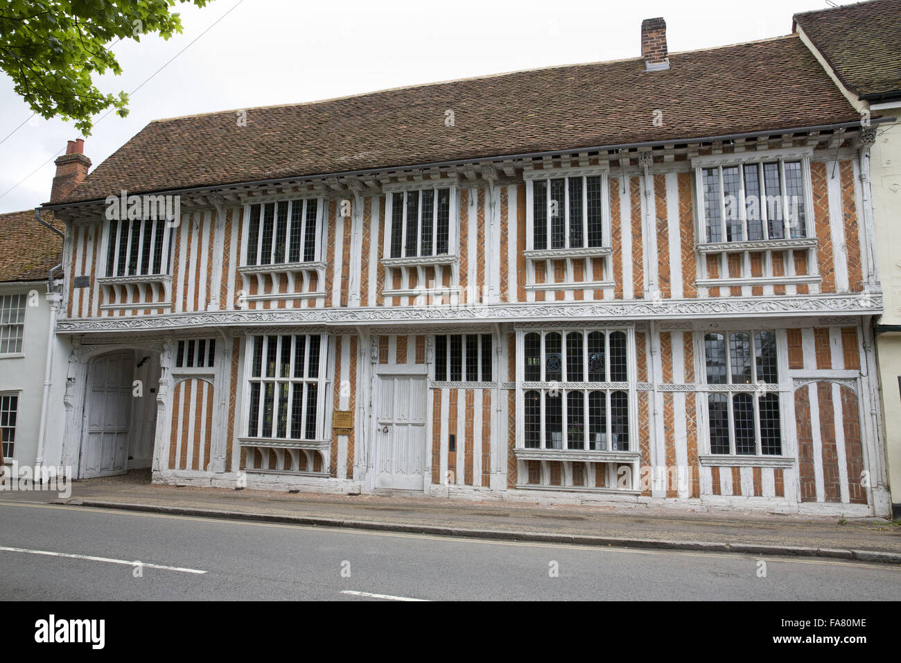 Una vista ravvicinata di windows e l'intonaco sulla parte esterna del Paycocke's House, Colchester, Essex Foto Stock