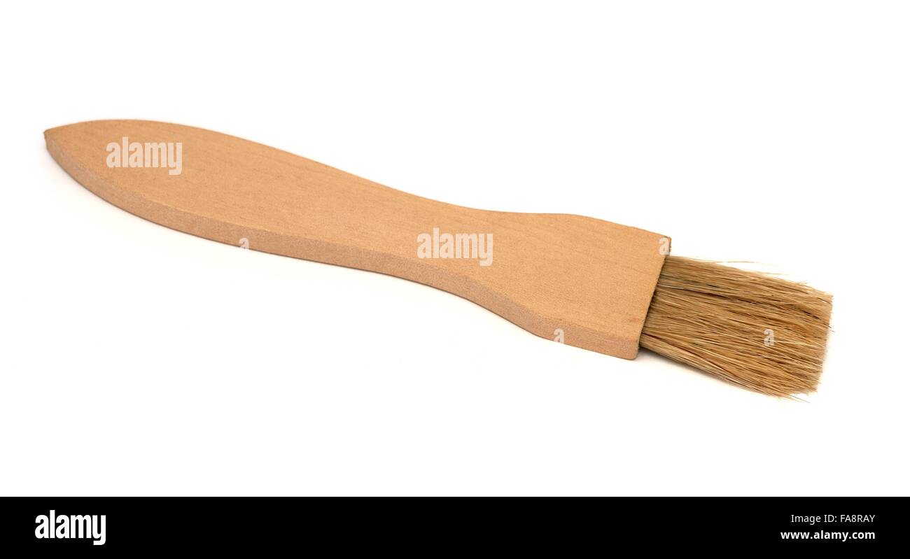 Una pasta di legno pennello su un bianco di sfondo per studio Foto Stock