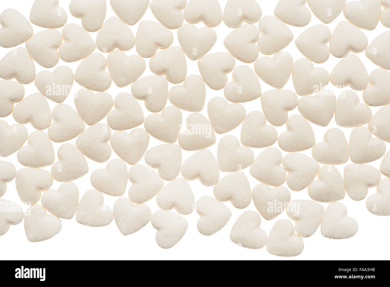Cuore bianco compresse di forma isolata su sfondo bianco Foto Stock Cuore bianco compresse di forma isolata su sfondo bianco Foto Stock