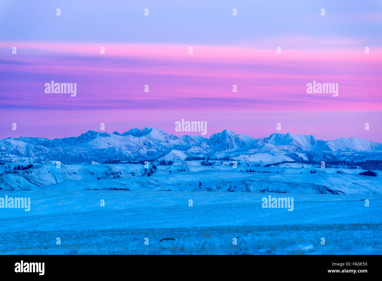 Tramonto in inverno in Idaho sette demoni montagne come si vede dal Zumwalt Prairie nella zona nord-est di Oregon. Foto Stock