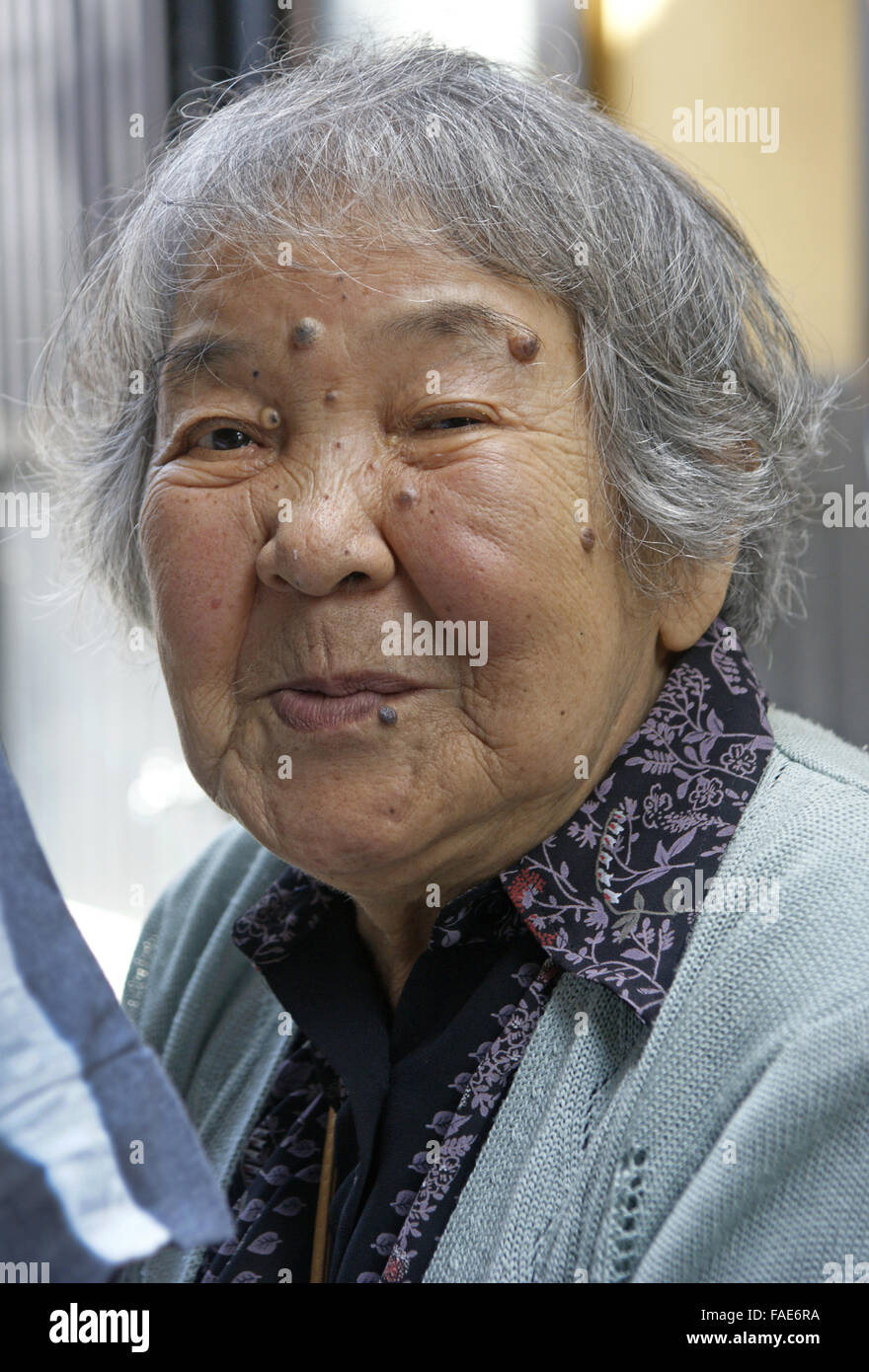 Vecchio sorridente Dama giapponese Foto Stock