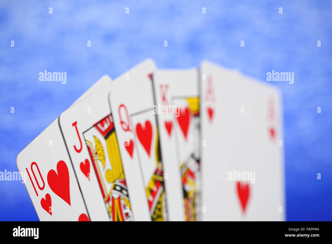 Generic giocando a carte che mostra un Royal Flush. Molto superficiale d o f. Loghi rimosso Foto Stock