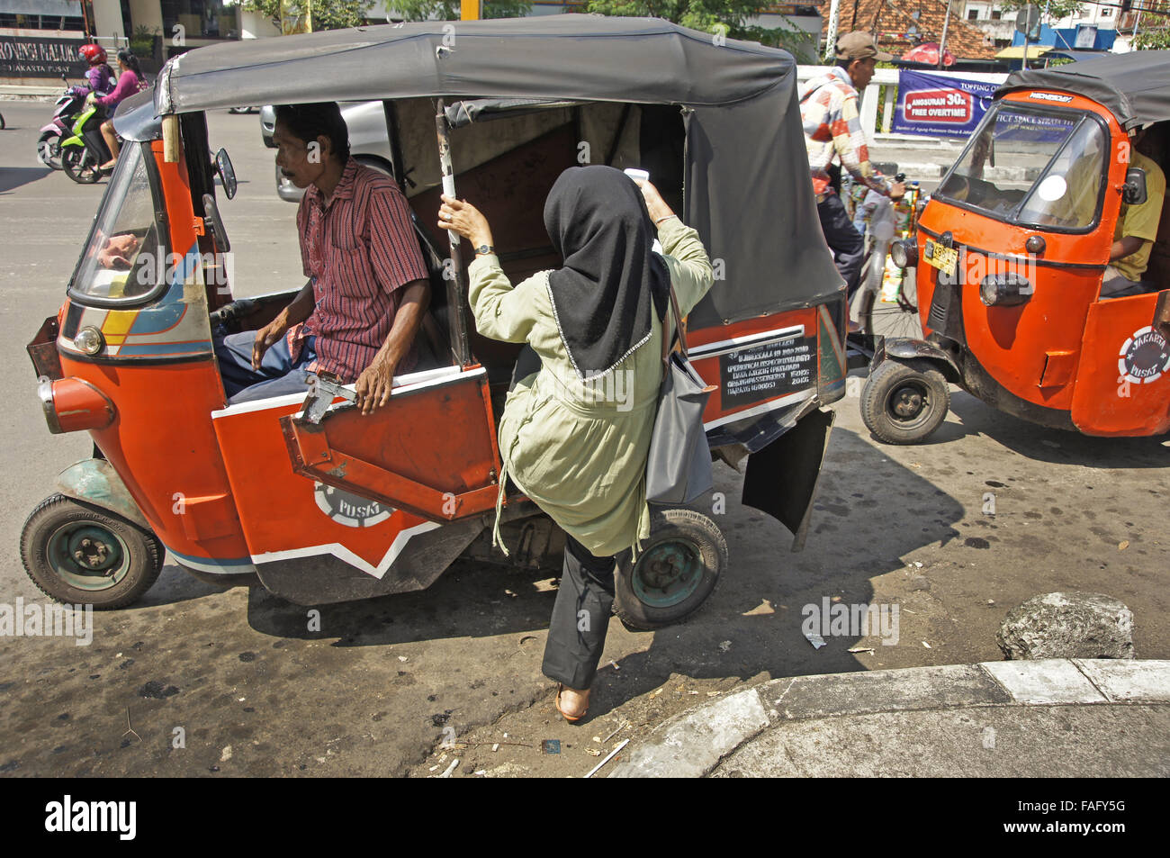 Schede di donna taxi in Giacarta Foto Stock