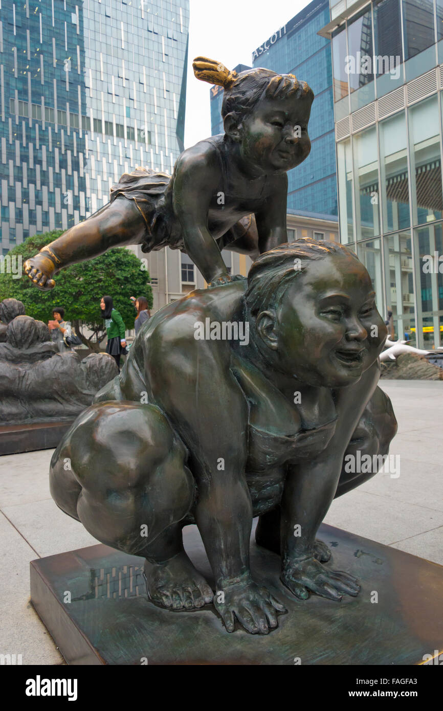 Moderna statua del "salto oltre la capra' gioco, Guangzhou, nella provincia di Guangdong, Cina Foto Stock